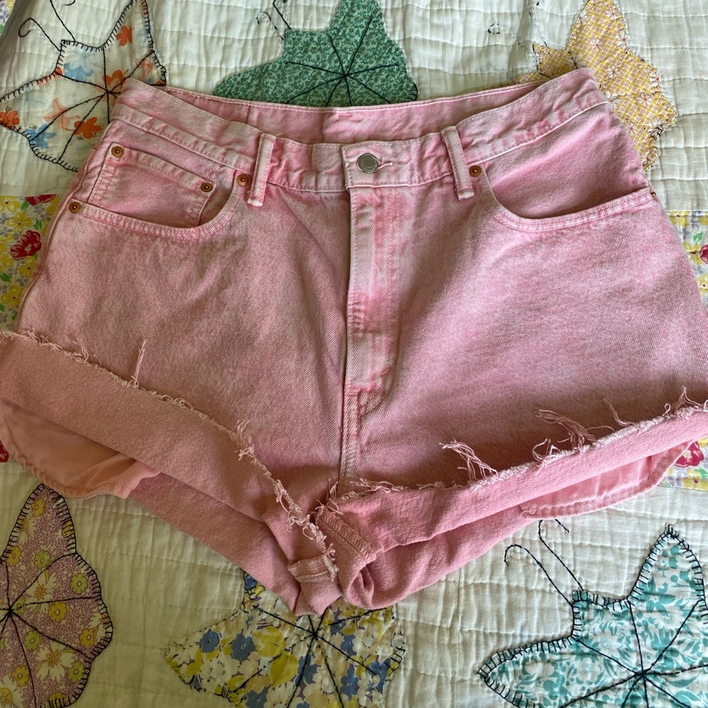baby pink acid wash high waisted denim Levi's shorts